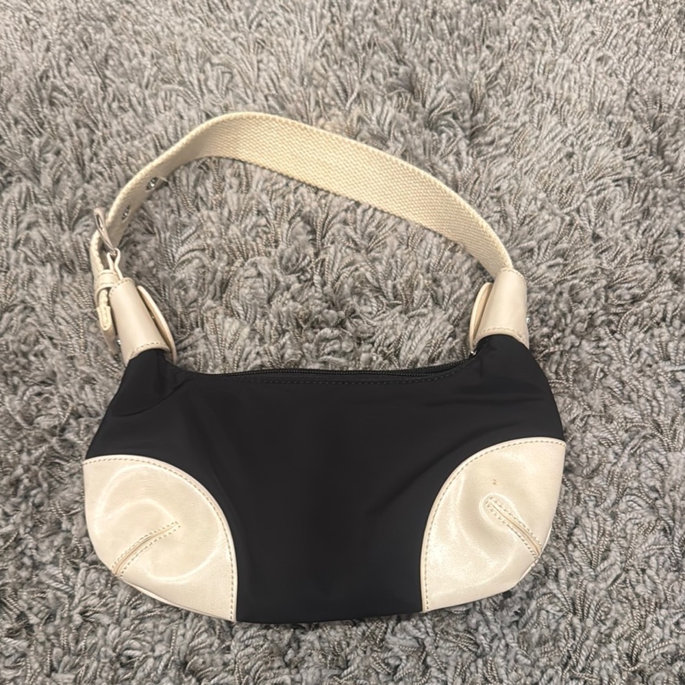 Brandy Melville black and cream purse